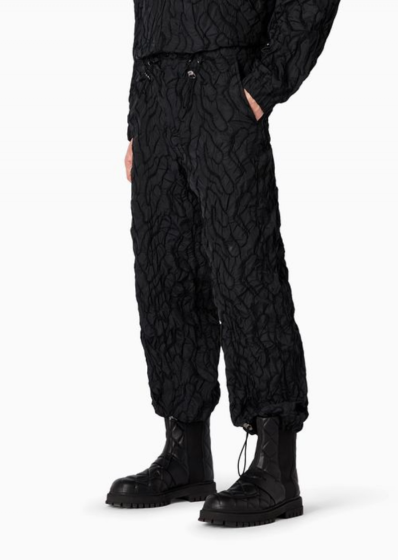 Black Emporio Armani Drawstring Trousers In Technical Fabric With All-over Raised Embroidery | EA-SN58270