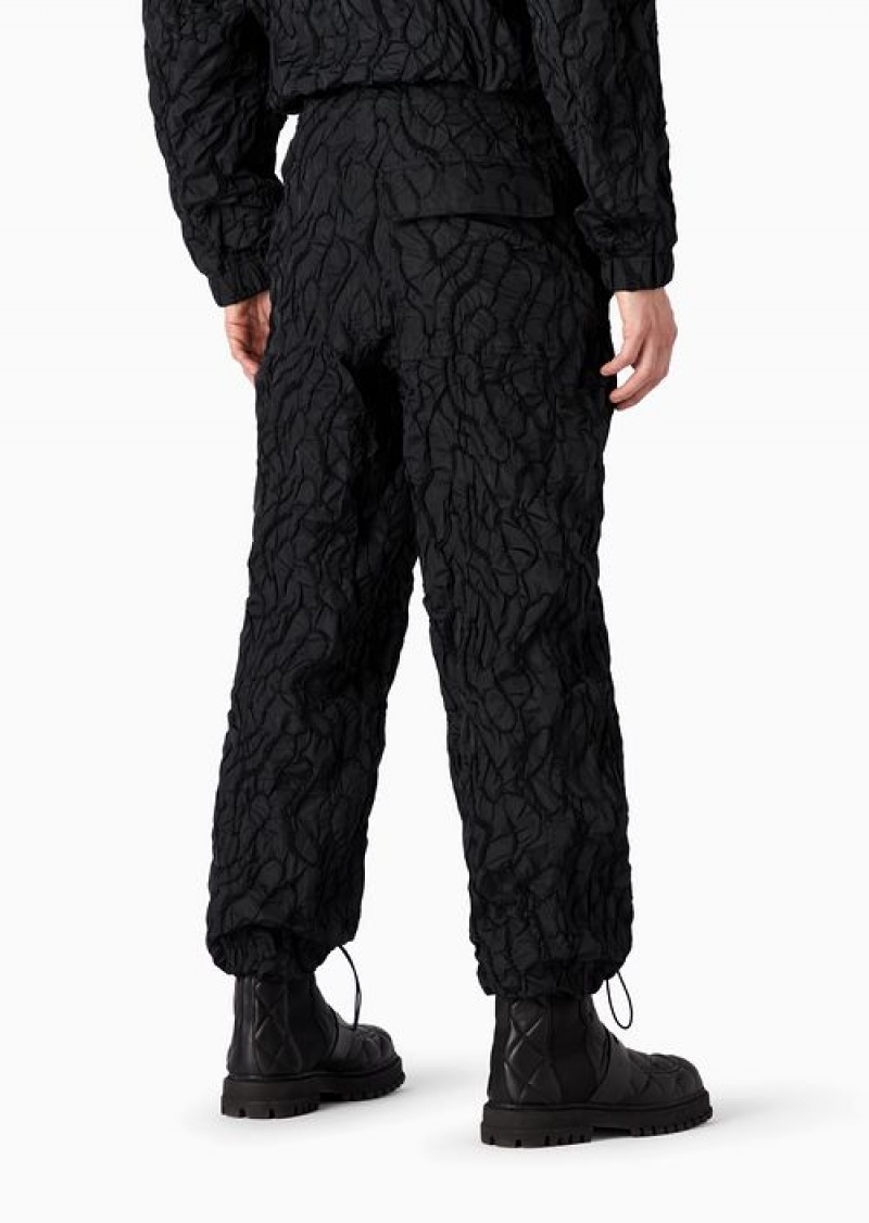 Black Emporio Armani Drawstring Trousers In Technical Fabric With All-over Raised Embroidery | EA-SN58270