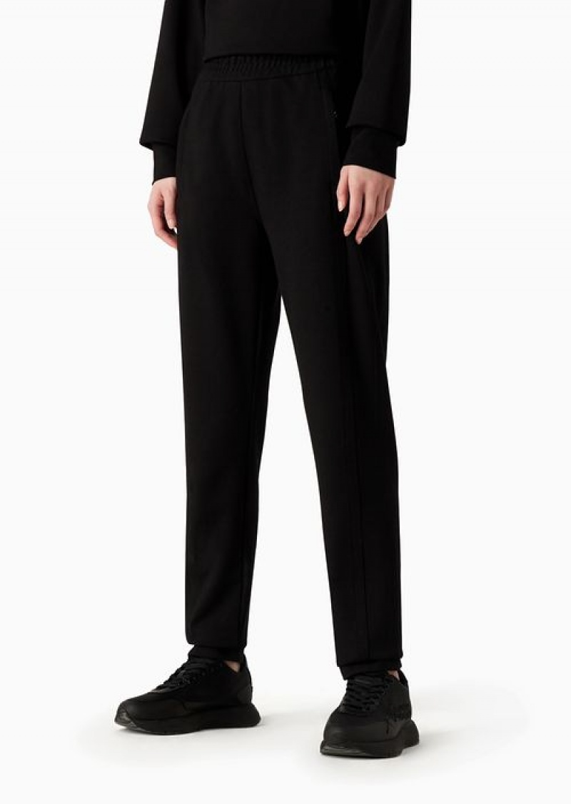 Black Emporio Armani Elasticated-waist Trousers In A Milano-stitch Fabric With A Travel Essentials Patch | EA-SN56812