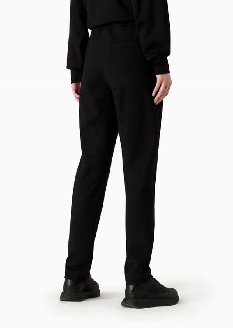 Black Emporio Armani Elasticated-waist Trousers In A Milano-stitch Fabric With A Travel Essentials Patch | EA-SN56812