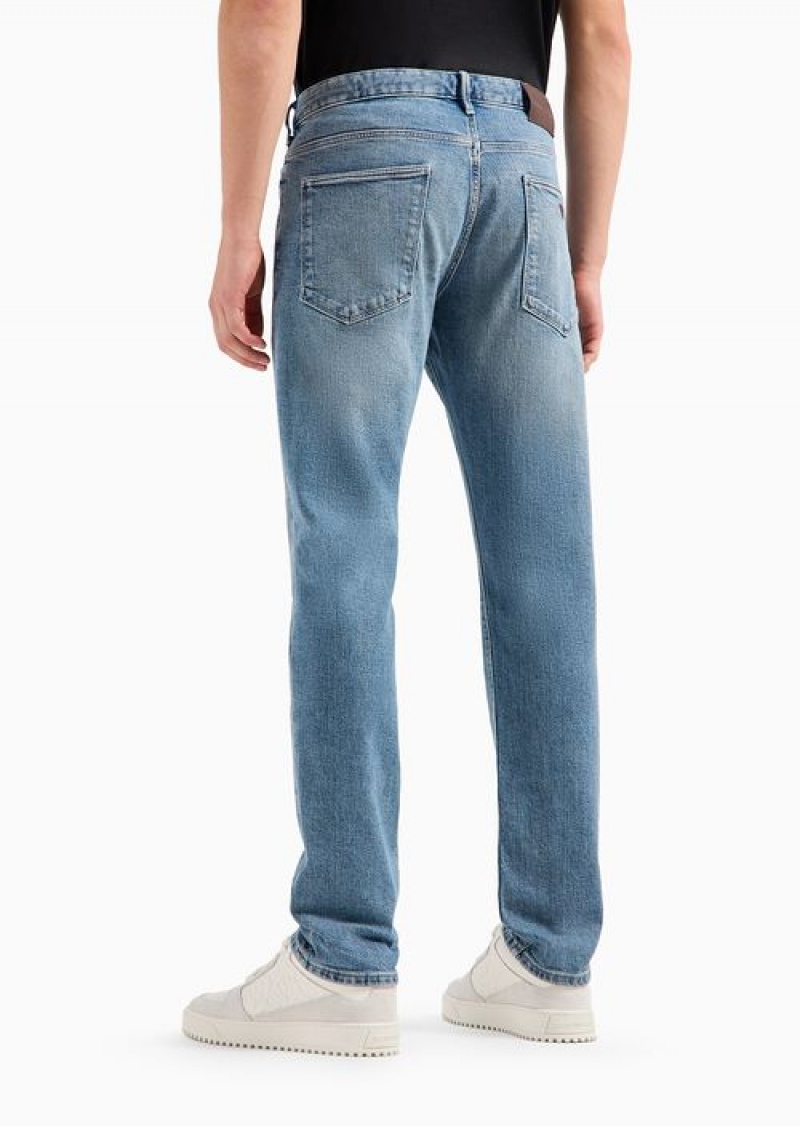 Light Blue Emporio Armani J06 Slim-fit Vintage-effect Denim Jeans | EA-SN57962